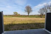 Blick von Terrasse auf Golfplatz